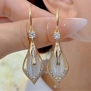 Elegant Gold and Silver Teardrop Earrings
